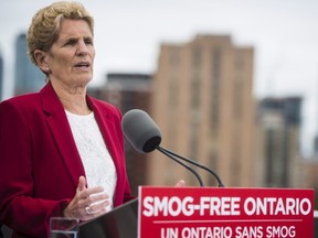 Ontario Liberal Leader Kathleen Wynne speaks to the media during a campaign event in Toronto on Wednesday, June 6, 2018. THE CANADIAN PRESS/ Tijana Martin