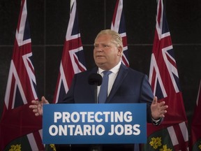 Ontario Premier-designate Doug Ford speaks to the media following a meeting with industry representatives in Toronto on Wednesday, June 13, 2018. THE CANADIAN PRESS/Tijana Martin