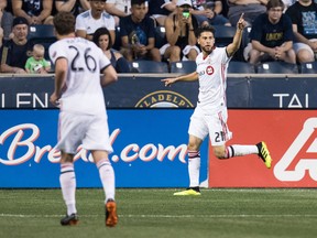Toronto FC's Jonathan Osorio, right, reacts to his goal during MLS action against the Philadelphia Union on June 8, 2018