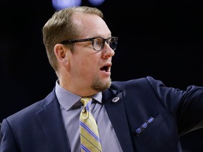 In this Feb. 29, 2016, file photo, Toronto Raptors assistant coach Nick Nurse is seen during the first half of an NBA basketball game against the Detroit Pistons, in Auburn Hills, Mich.