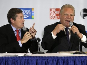 John Tory and Doug Ford are pictured at a mayoral campaign debate at George Brown College in Toronto on October 8, 2014. Craig Robertson/Toronto Sun