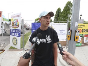 Tanner Tracy, a ribber with the HogFather, witnessed the mayhem after Saturday night's shooting at the Pickering Ribfest. Jack Boland/Toronto Sun