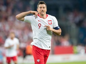 Poland's Robert Lewandowski reacts during the international friendly football match between Poland and Chile at the Arena Poznan stadium in Poznan, Poland, on June 8, 2018