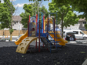 The Scarborough townhouse complex playground, that was the scene a shooting leaving two girls injured near near McCowan Rd. and McNicoll Ave., the previous day in Toronto,Ont. on Friday June 15, 2018. (Ernest Doroszuk/Toronto Sun/Postmedia)