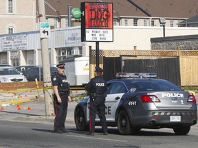 One man was killed and another wounded in a double stabbing at a bar on St. Clair Ave. E. just east of Midland Ave., in Scarborough, around 2 a.m. on Saturday, June 16, 2018. (Chris Doucette/Toronto Sun/Postmedia Network)