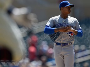 Marcus Stroman of the Toronto Blue Jays looks on as Eddie Rosario of the Minnesota Twins rounds the bases after hitting a solo home run during the second inning of the game on May 2, 2018