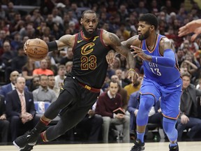 Cavaliers’ LeBron James (left) and Thunder’s Paul George are the two top free agents this summer. Tony Dejak/AP