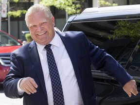 Ontario Premier-designate Doug Ford arrives at the Postmedia offices in Toronto for an interview with the Toronto Sun on Friday June 8, 2018. Stan Behal/Toronto Sun