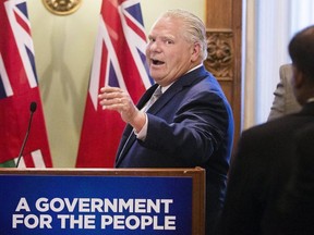 Premier-designate Doug Ford addresses his caucus and the media at Queen's Park in Toronto, Ont. on Tuesday, June 19, 2018. Stan Behal/Toronto Sun