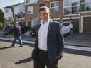 Toronto Mayor John Tory, walks to speak to local residents following a shooting that left two girls injured at a Scarborough townhouse complex playground near McCowan Rd. and McNicoll Ave., in Toronto,Ont. on Friday June 15, 2018. (Ernest Doroszuk/Toronto Sun/Postmedia)