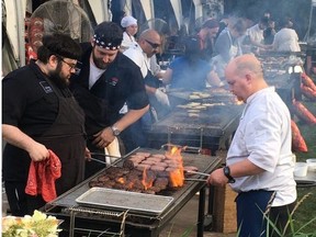 Chefs whip up beefy goodness at the Hamburger Hop. The Hop is a crowd favourite at the annual Chicago Gourmet festival. KEVIN HANN/POSTMEDIA NETWORK