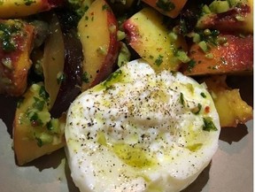Buffalo-milk burrata cheese with stone fruit and salsa verde at The Loyalist, one of many great places to eat in the West Loop area. KEVIN HANN/POSTMEDIA NETWORK