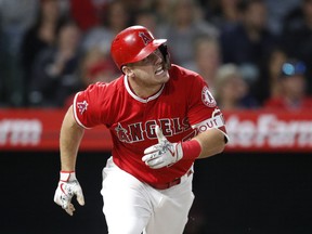 Los Angeles Angels' Mike Trout reacts after hitting a fly ball during the fourth inning of a baseball game against the Houston Astros, Monday, May 14, 2018, in Anaheim, Calif. (AP Photo/Jae C. Hong) ORG XMIT: ANS107