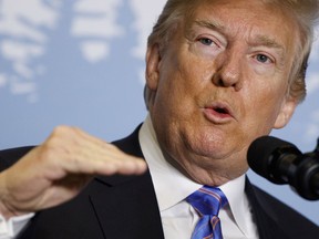 President Donald Trump speaks during a news conference at the G-7 summit, Saturday, June 9, 2018, in La Malbaie, Quebec, Canada.