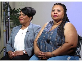 Alice Marie Johnson, left, and her daughter Katina Marie Scales wait to start a TV interview on Thursday, June 7, 2018 in Memphis, Tenn. Johnson, 63, whose life sentence was commuted by President Donald Trump thanked him on Thursday for "having mercy" and said reality TV star Kim Kardashian West saved her life.