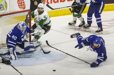 Toronto Marlies Vincent LoVerde and goalie Garret Sparks during 1st period action against Texas Stars Curtis McKenzie in Game 6 of the 2018 Calder Cup Finals at the Ricoh Coliseum in Toronto, Ont. on Tuesday June 12, 2018. Ernest Doroszuk/Toronto Sun/Postmedia