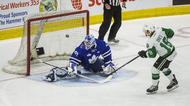 Toronto Marlies goalie Garret Sparks keeps an eye on the puck (no goal)  during 1st period action against Texas Stars Sheldon Dries in Game 7 of the 2018 Calder Cup Finals at the Ricoh Coliseum at the Ricoh Coliseum in Toronto, Ont. on Thursday June 14, 2018. Ernest Doroszuk/Toronto Sun/Postmedia