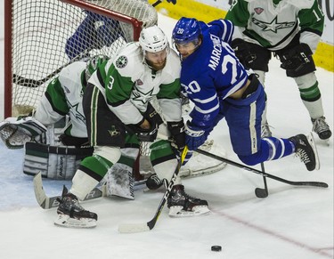Toronto Marlies Mason Marchment  during 1st period action against Texas Stars Dillon Heatherington in Game 7 of the 2018 Calder Cup Finals at the Ricoh Coliseum at the Ricoh Coliseum in Toronto, Ont. on Thursday June 14, 2018. Ernest Doroszuk/Toronto Sun/Postmedia