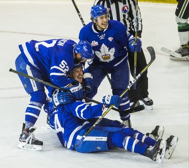 Toronto Marlies celebrate their second goal - scored by Mason Marchment (centre of image) during 1st period action against Texas Stars in Game 7 of the 2018 Calder Cup Finals at the Ricoh Coliseum at the Ricoh Coliseum in Toronto, Ont. on Thursday June 14, 2018. Ernest Doroszuk/Toronto Sun/Postmedia