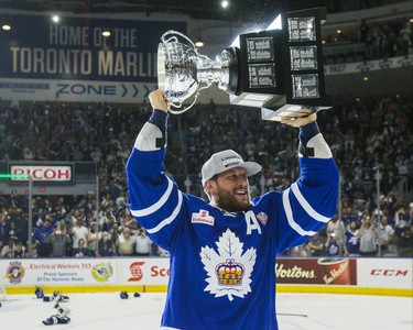 Toronto Marlies Richard Clune hoists up theCalder Cup after defeating Texas Stars in Game 7 at the Ricoh Coliseum in Toronto, Ont. on Thursday June 14, 2018. Ernest Doroszuk/Toronto Sun/Postmedia