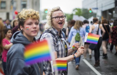 Cheering on the Dyke March 2018 on Church St. and Bloor St. E in downtown Toronto, Ont. on Saturday June 23, 2018. Ernest Doroszuk/Toronto Sun/Postmedia