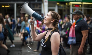 Making her voice heard in the Dyke March 2018 along Yonge St.  in downtown Toronto, Ont..  on Saturday June 23, 2018. Ernest Doroszuk/Toronto Sun/Postmedia