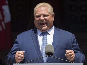 Doug Ford sworn in as premier of Ontario in Toronto on Friday June 29, 2018. Craig Robertson/Toronto Sun