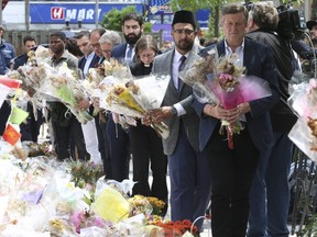 The Olive Park Square van attack memorial was decommissioned on Sunday with the flowers being put into 10 wheelbarrows for all the murdered victims on Sunday. Jack Boland/Toronto Sun