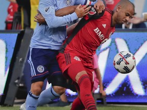 New York City FC forward David Villa (left) has scored seven times in four matches against Toronto FC. (The Associated Press)