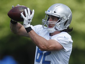 Detroit Lions tight end Luke Willson catches a pass during practice at the NFL team's spring camp in Allen Park, Mich., Wednesday, June 6, 2018. (AP Photo/Paul Sancya)