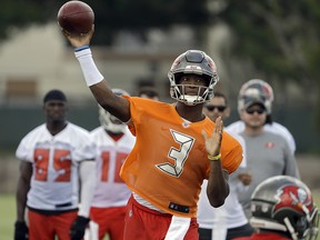 Tampa Bay Buccaneers quarterback Jameis Winston (3) throws a pass during an NFL football minicamp Thursday, June 14, 2018, in Tampa, Fla. (AP Photo/Chris O'Meara) ORG XMIT: FLCO101