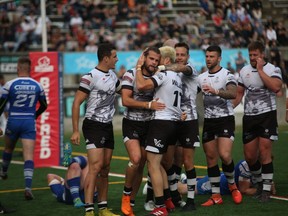 Toronto Wolfpack players celebrate during their 64-0 win over Barrow at Lamport Stadium on June 23, 2018. (TORONTO WOLFPACK PHOTO)