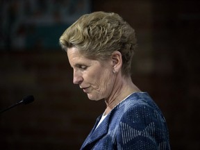 Ontario Liberal Leader Kathleen Wynne takes questions from the media after making a policy announcement during a campaign stop in Toronto, on Thursday, May 24, 2018. THE CANADIAN PRESS/Chris Young