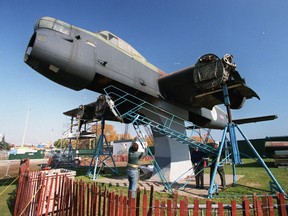 Workers continue to dismantle the World War II Lancaster bomber just east of Ontario Place. (Postmedia file)
