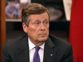 Toronto Mayor John Tory looks on during an intergovernmental meeting in the wake of a mass shooting which happened in Toronto Sunday night, at Toronto City Hall on Monday, July 23, 2018. THE CANADIAN PRESS/Nick Kozak