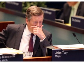 Mayor John Tory at City Council in the wake of Premier Doug Ford's announcement to to reduce city council to 25 wards in Toronto, Ont. on Friday July 27, 2018. Dave Abel/Toronto Sun/Postmedia Network