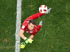 Uruguay goalkeeper Fernando Muslera turns the ball into his own net against France on Friday. (GETTY IMAGES)