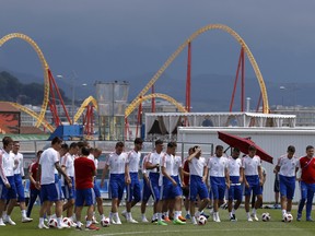 Russia's players take part in training on Friday before Saturday's game against Croatia. (AP PHOTO)