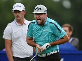 Robert Garrigus reacts to his tee shot on the 17th tee during the first round at the RBC Canadian Open at Glen Abbey Golf Club on Thursday. Minas Panagiotakis/Getty Images)