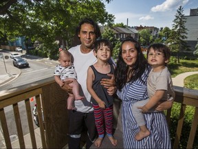 Michael and his wife, Sammy Barcelos, pose with their children. (ERNEST DOROSZUK, Toronto Sun)
