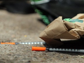 Needles on the sidewalk as Councillor Giorgio Mammoliti speaks in protest of the Toronto Safe injection site near Yonge Dundas Sq. in Toronto on Monday May 28, 2018. Dave Abel/Toronto Sun