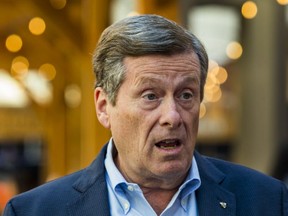 Toronto Mayor John Tory talks with media at the Union Summer market in front of Union Station on Tuesday July 3, 2018. (Ernest Doroszuk,Toronto Sun)