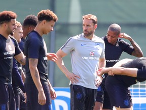 England manager Gareth Southgate guides his squad during training on Friday. (GETTY IMAGES)