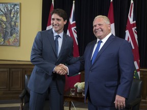 Prime Minister Justin Trudeau met with Ontario Premier Doug Ford at Queens Park in Toronto on Thursday July 5, 2018. (Stan Behal/Toronto Sun/Postmedia Network)