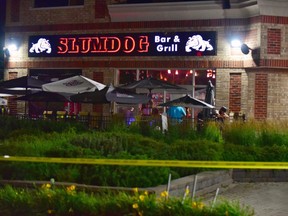 One person is dead after a shooting late Thursday night at the Slumdog Bar and Grill on Brisdale Dr. in Brampton. (Bryan Passifiume/Toronto Sun)