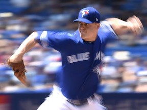 Toronto Blue Jays reliever Aaron Loup (62) pitches to the Los Angeles Angels in Toronto on May 24, 2018. (THE CANADIAN PRESS/Nathan Denette)