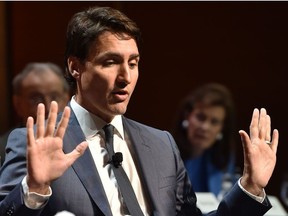 In this file photo taken on May 17, 2018 Canadian Prime Minister Justin Trudeau speaks during a lunch at the Economic Club of New York, at the Ziegfeld Ballroom, in New York City.