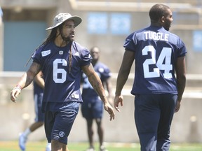 Toronto Argonauts Marcus Ball LB (6) with teammate Justin Tuggle DL (24) during a light  practice at Lamport Stadium in Toronto, Ont. on Monday July 9, 2018. Jack Boland/Toronto Sun/Postmedia Network