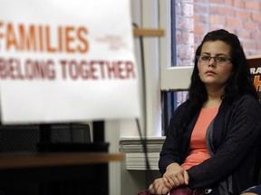 Yolany Padilla, an asylum seeker separated from her 6-year-old son as part of the Trump Administration's "zero tolerance" policy, looks on at a news conference Wednesday, July 11, 2018, in Seattle. (AP Photo/Elaine Thompson)