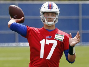Buffalo Bills rookie quarterback Josh Allen throws a pass during the team's rookie minicamp, in Orchard Park, N.Y. on May 11, 2018. (AP Photo/Jeffrey T. Barnes)